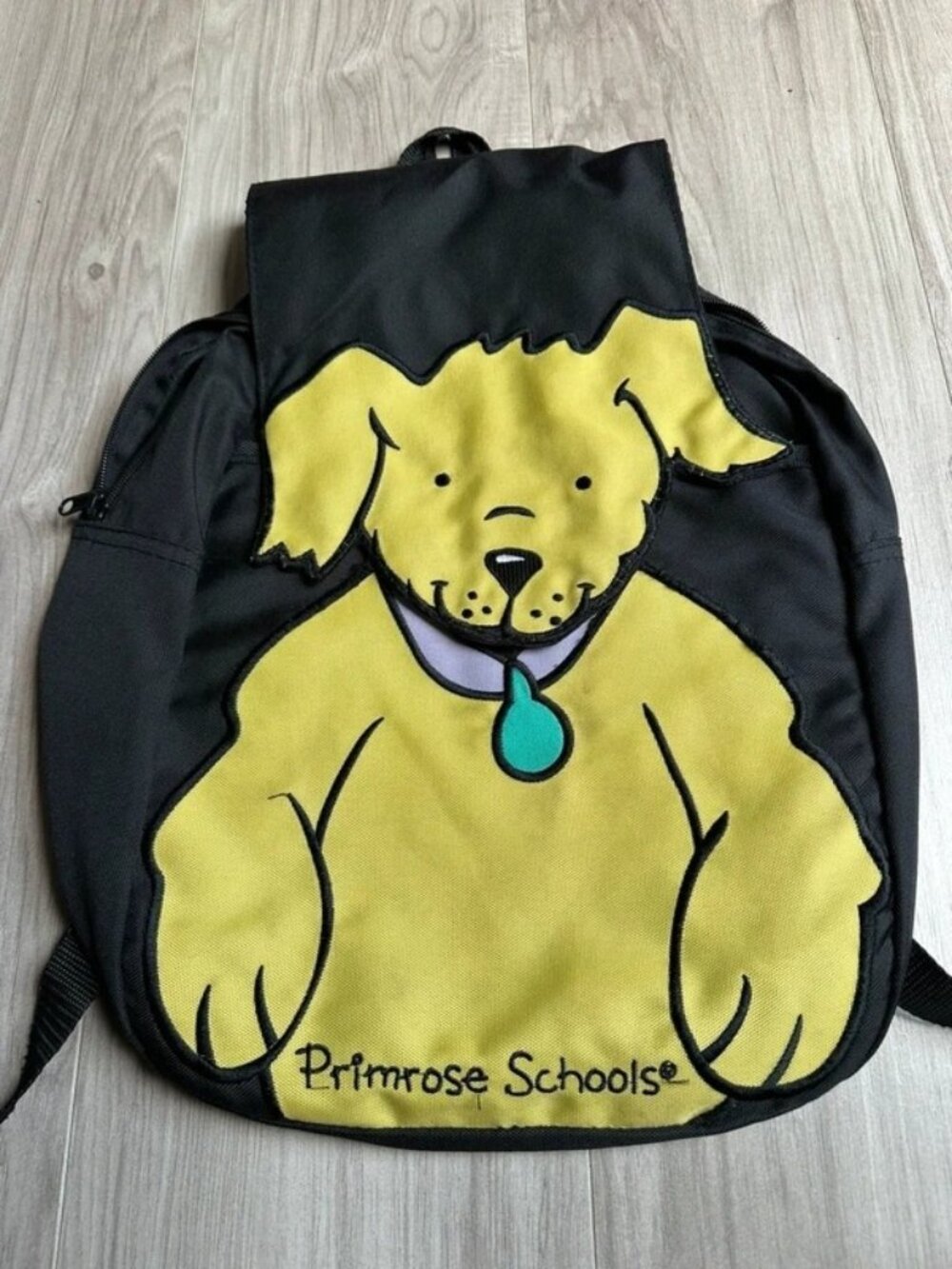 Primrose Schools Yellow Dog Backpack